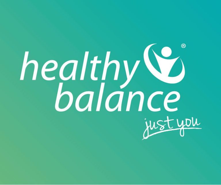 Weiße Schrift auf grünlichem Grund: Healthy Balance — just you plus Logo